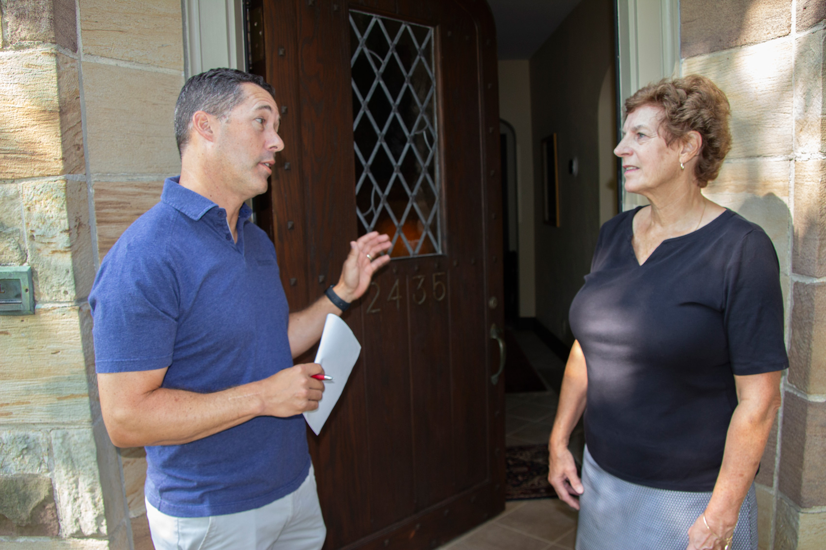 Todd Walter going door to door introducting himself and discussing issues with UA residents