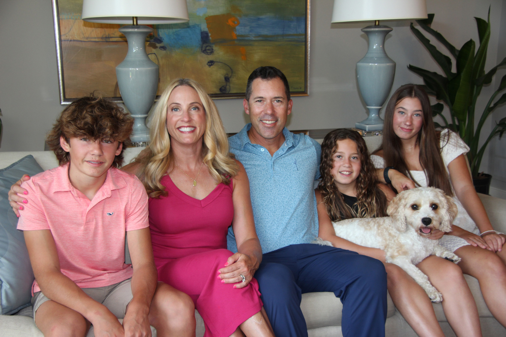 Todd Walter and family sitting on sofa